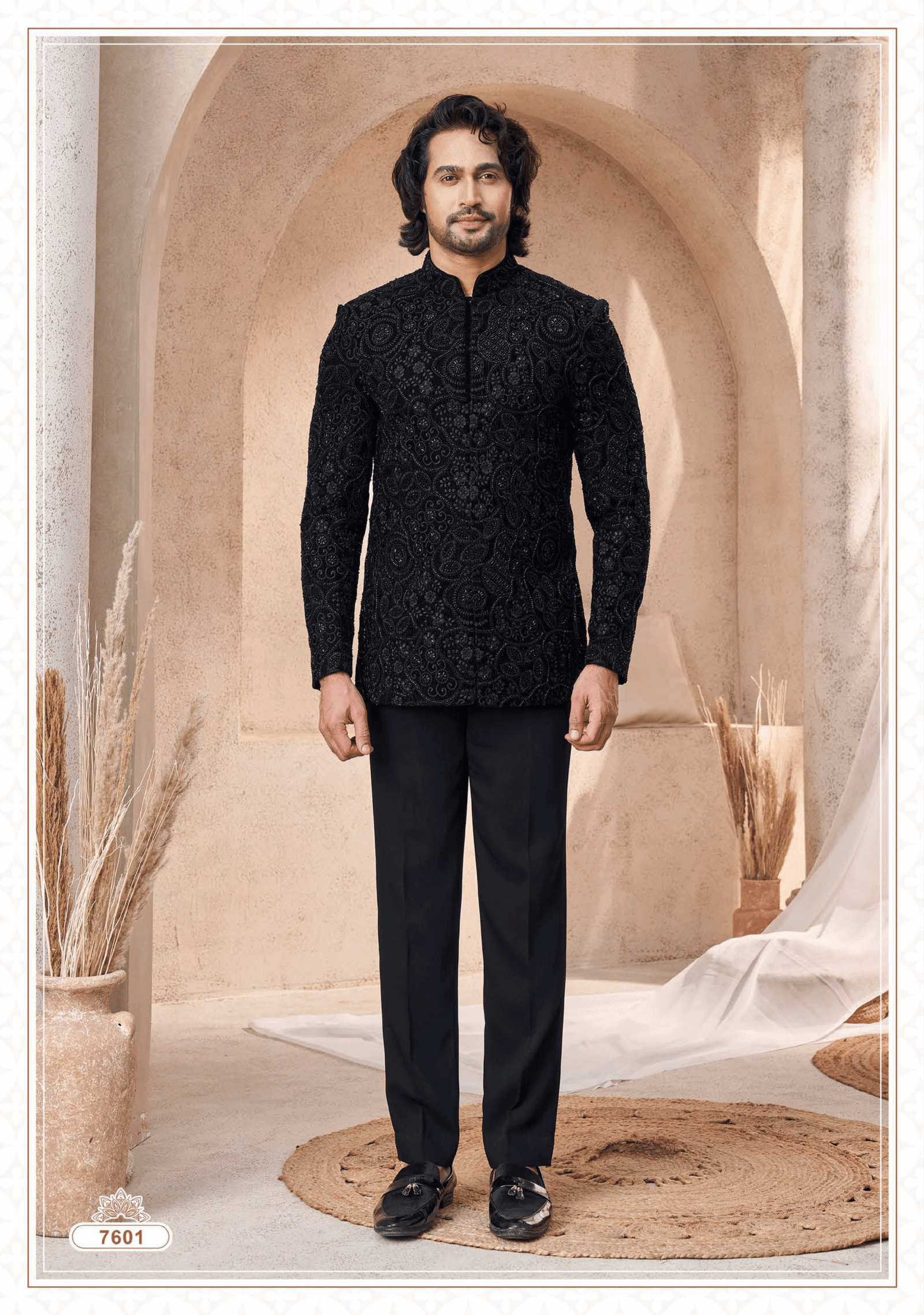 Men’s black Jodhpuri suit with heavy embroidery, perfect for wedding and festive occasions from ShubhVivah Showroom