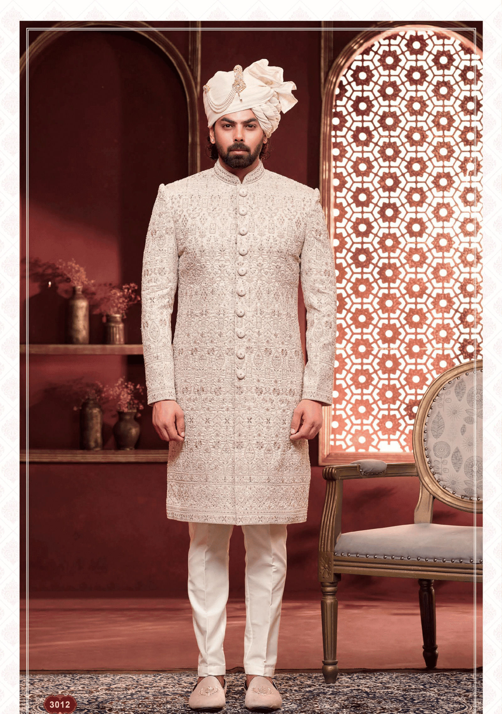 Men’s cream sherwani with golden embroidery, perfect for wedding and festive occasions from ShubhVivah Showroom