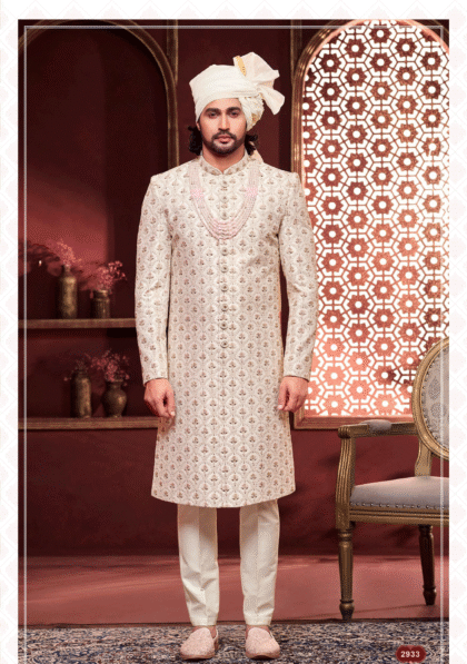 Men’s white sherwani with golden embroidery, ideal for wedding and festive occasions from ShubhVivah Showroom
