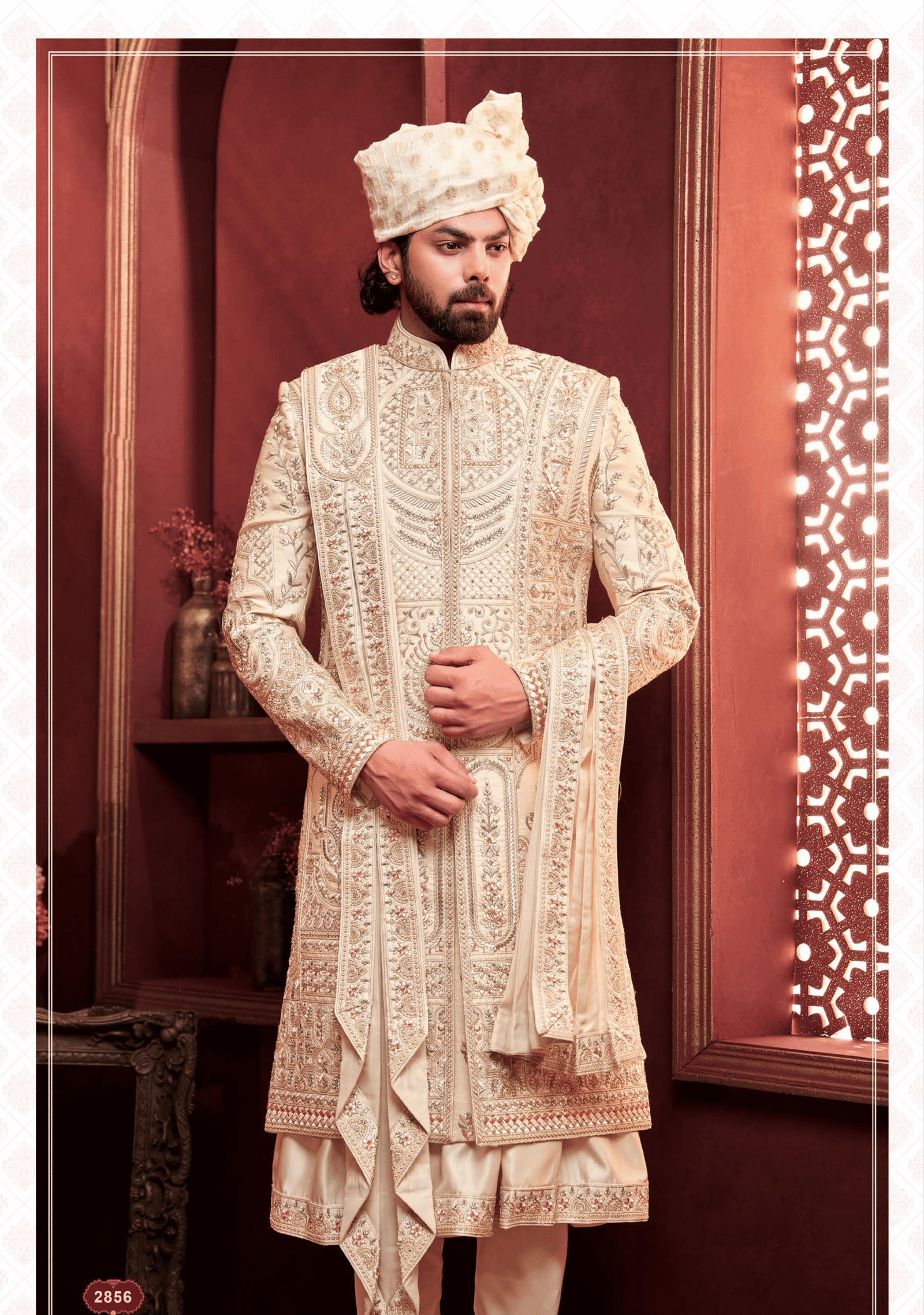 Men’s cream sherwani with heavy embroidery, perfect for wedding and festive occasions from ShubhVivah Showroom