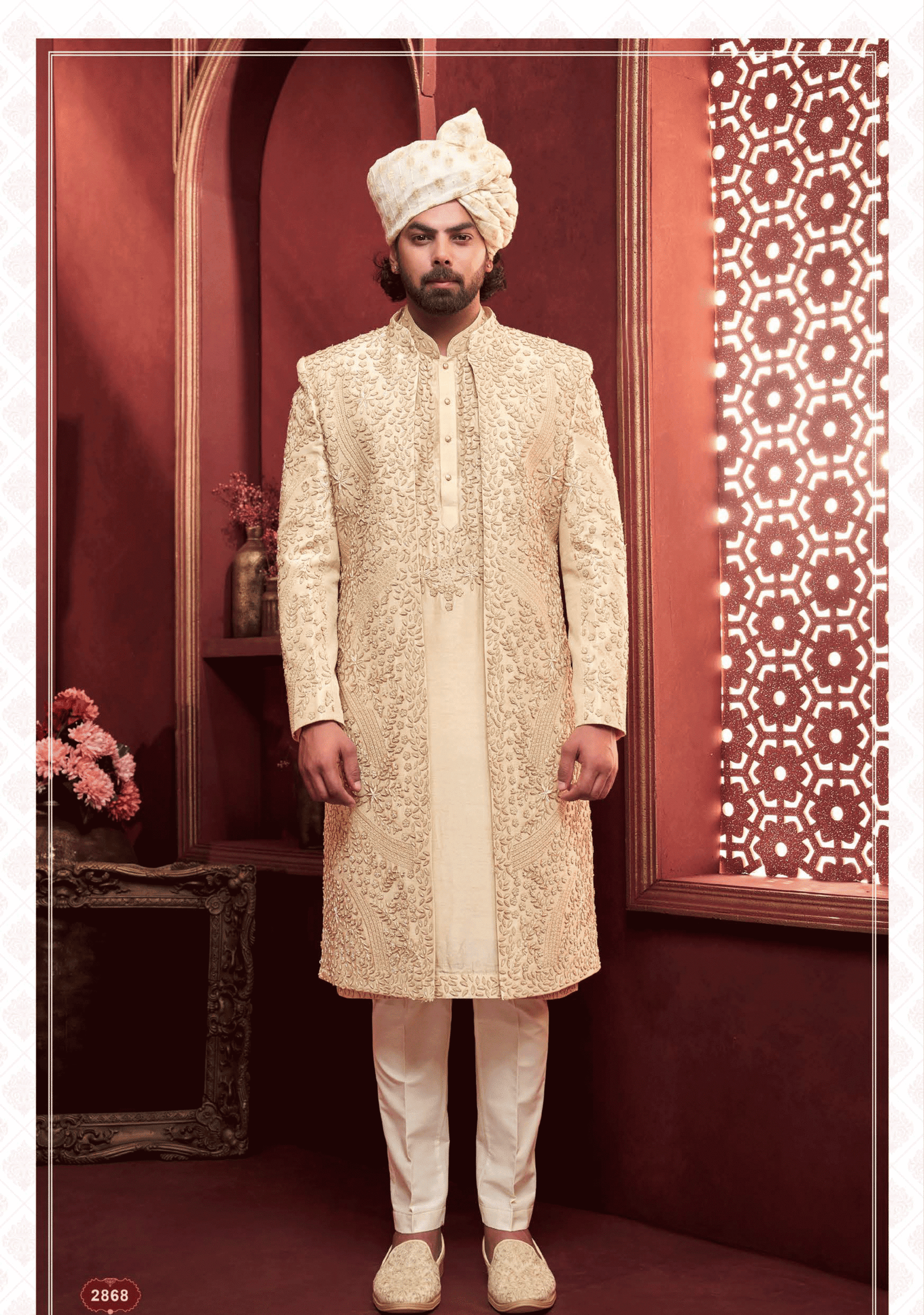 Men’s cream sherwani with elegant leaves work, perfect for wedding and festive occasions from ShubhVivah Showroom