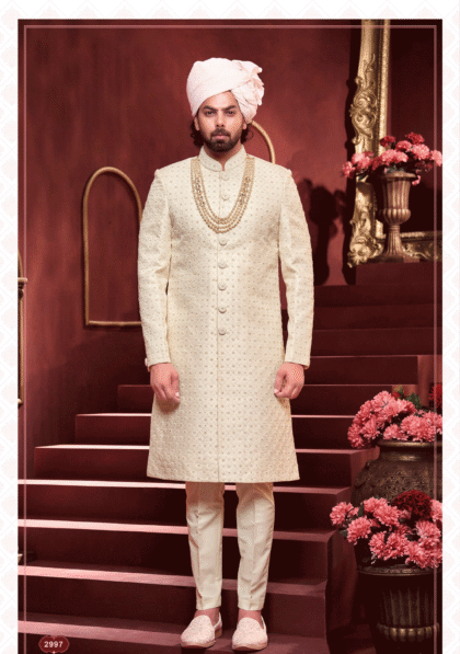 Elegant cream sherwani with intricate embroidery for men, perfect for wedding and festive occasions from ShubhVivah Showroom